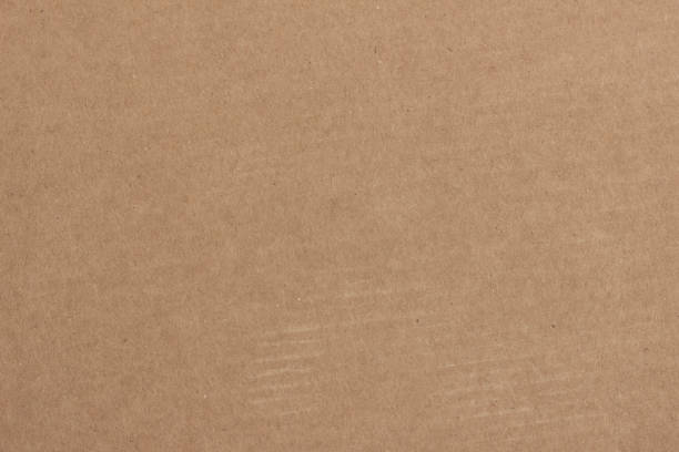 istock The surface structure of brown cardboard. 1292895520
