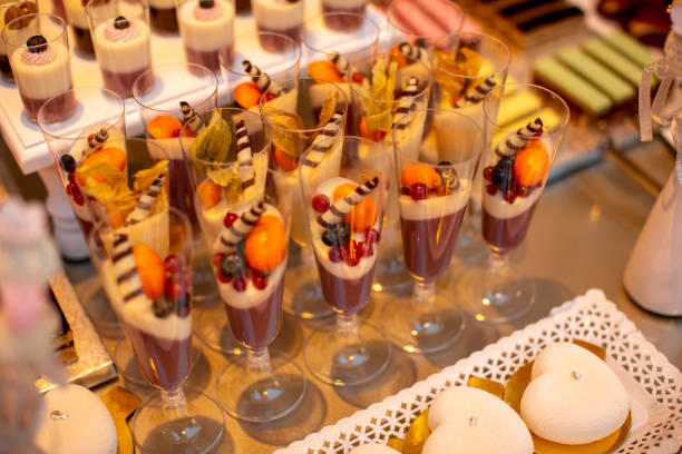 istock candy bar with delicious sweets : macaroons, cupcakes, cakes and cake pops 1292896563