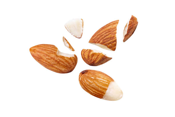 istock Flying almonds in the air close-up on white isolated 1292899114