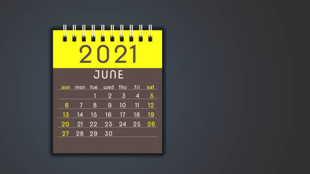 istock Stylized 2021 calendar notebook June page in yellow, front view with copy space 1292899318