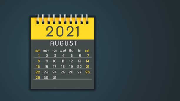 istock Stylized 2021 calendar notebook August page in yellow, front view with copy space 1292899687