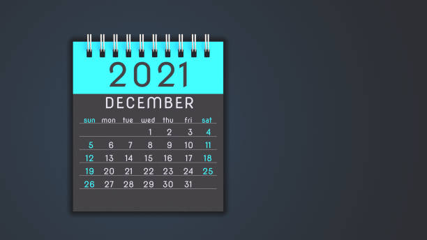 istock Stylized 2021 calendar notebook December page in blue, front view with copy space 1292899913