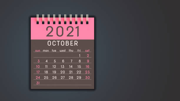 istock Stylized 2021 calendar notebook October page in pink, front view with copy space 1292899990