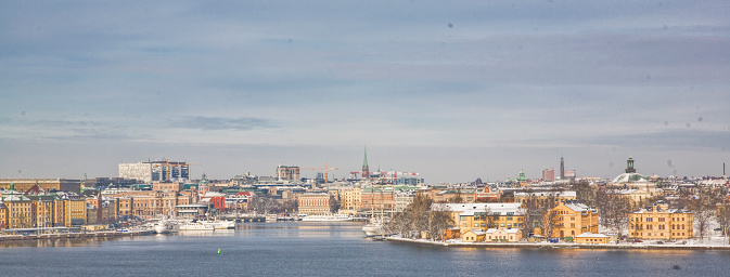 Panoramal view of Stockholm, Sweden. Old city to the left, Norrrmalm center and Skeppsholmen to the right. Lake Mälaren in the foreground.