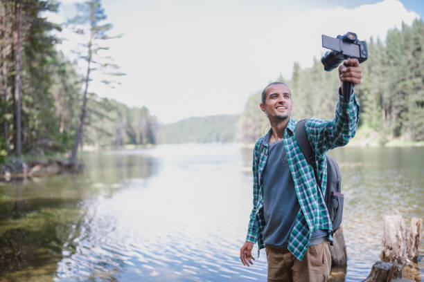 istock Young Traveler Vlogging In Nature. 1292903477