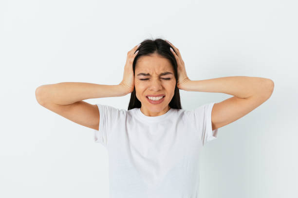 istock Young woman with headache 1292906078