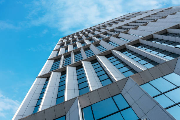 istock Office building in the blue sky 1292909338