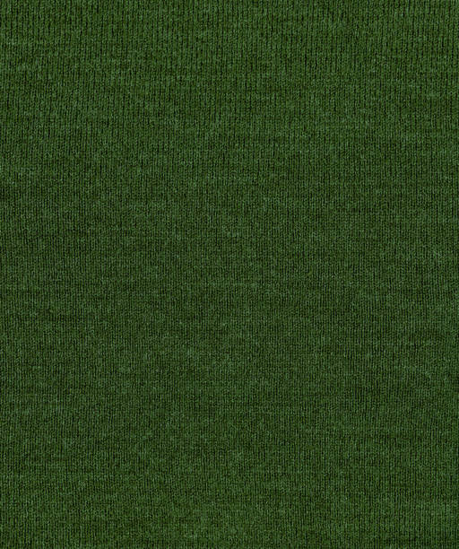 istock Dark green  knit texture sweater background 1292911843