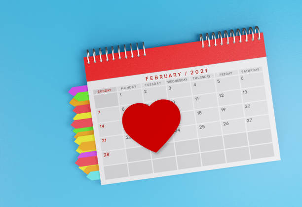 istock Calendar And Red Heart Shape Sticky Note Paper. 1292912626