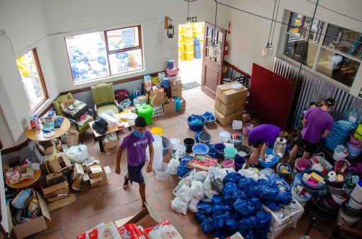 12.23.2020 From above, volunteers sorting through the donations that came to Living Hope Church. The donations was for the fire victims of Masiphumelele