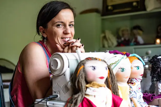 Photo of Portrait of woman tailor looking at camera