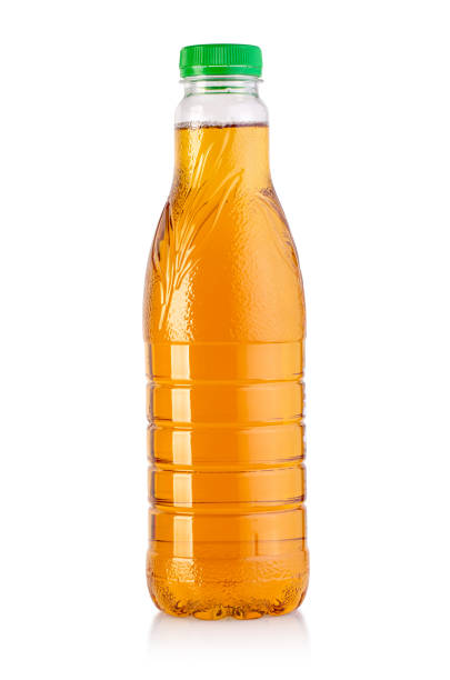 Apple juice in plastic bottle isolated on white background with clipping pat