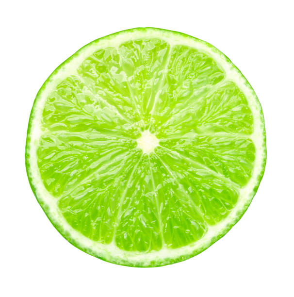 istock Juicy slice of lime isolated 1292920488