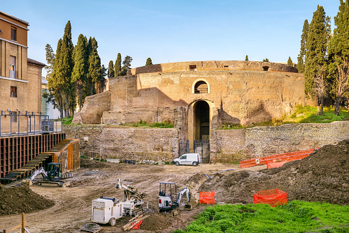 Archaeological excavations near the Mausoleum of Augustus. The imposing mausoleum of Augustus, also called Augusteo, was the funerary monument of the emperor Augustus. Undergoing a long restoration, it should open to the public in March 2021. The mausoleum, built starting from 28 BC. it stood in the northern part of the Campo Marzio and was one of the wonders of imperial Rome. A few meters away is the Ara Pacis, the altar dedicated to peace erected by Augustus himself in the year 9 BC. Image in high definition format.