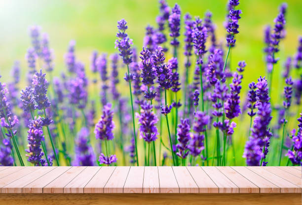 istock Wooden board with flower background. Empty wooden table with copy space 1292928593