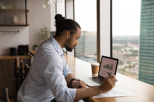 istock African American male worker work on laptop in office 1292931086