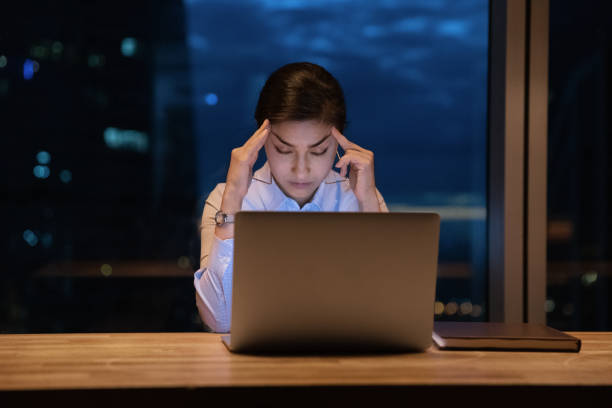 istock Tired Indian female employee fall asleep at workplace 1292931166