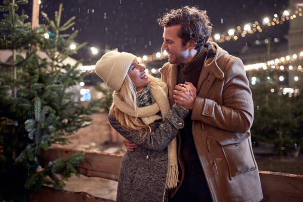 istock Couple choosing a Christmas tree together 1292935027