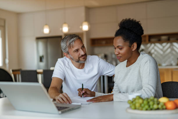 istock Home office, man looking at woman. 1292939667