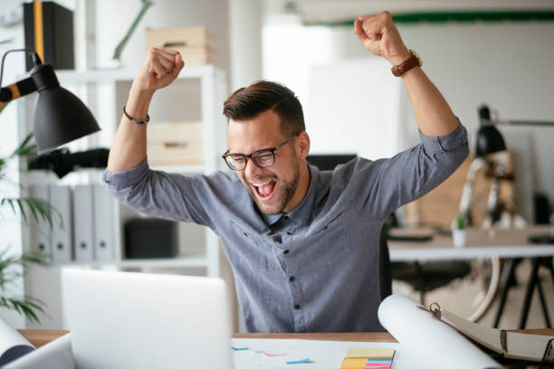 istock Happy businessman working in the office. 1292939842