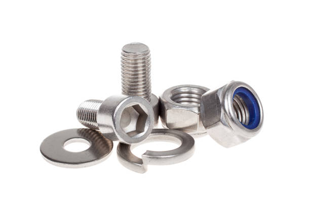 istock Bolts and nuts, isolated on white. Industry or construction concept 1292943731