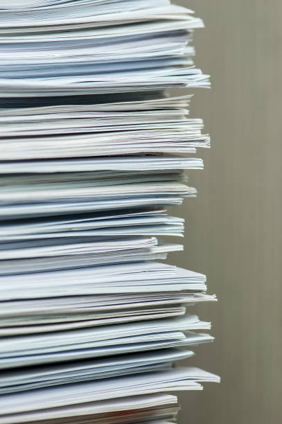 istock pile of paper documents in the office 1292948413