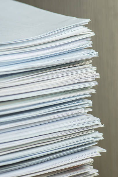 istock pile of paper documents in the office 1292948414
