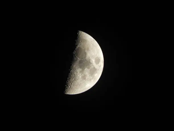 First Quarter Moon Phase in A Pitch Black  Sky