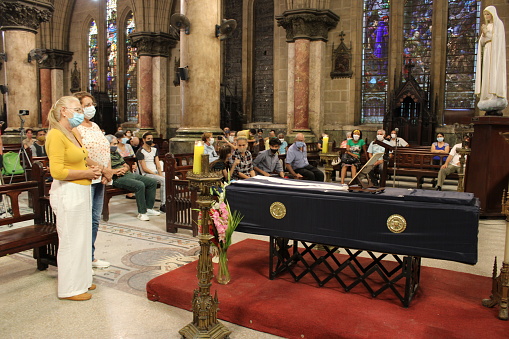 Havana - CUB; December 16, 2020: Funeral of a Catholic priest at the Church of the Sacred Heart of Jesus in Havana. Many faithful attend to dismiss their priest.