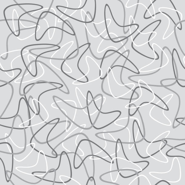 Gray Retro Boomerangs Seamless Pattern Vector illustration of a gray mid century boomerang seamless pattern. boomerang stock illustrations