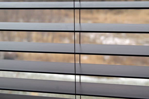 istock Wood Window Blinds in Bedroom 1292954846