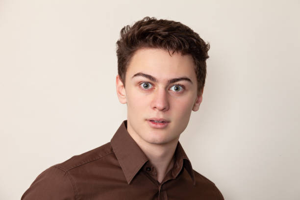 istock Studio portrait of 18 year old man 1292956432