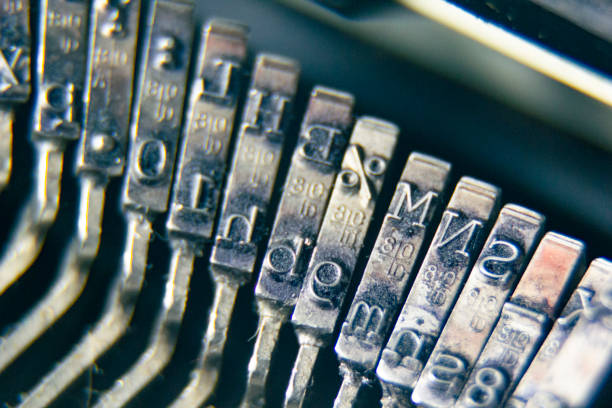 istock The iron hammers with the letters imprinted inside an old typewriter 1292958892