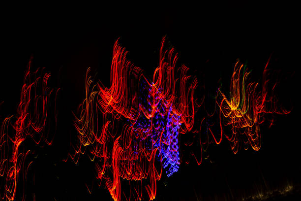 istock Glowing light line swirls. Abstract luminous light speed motion effect 1292961080