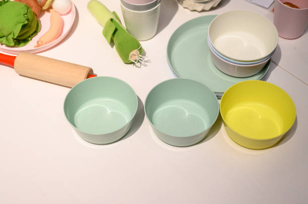 istock Set of children's plastic bowls on restaurant table 1292972399