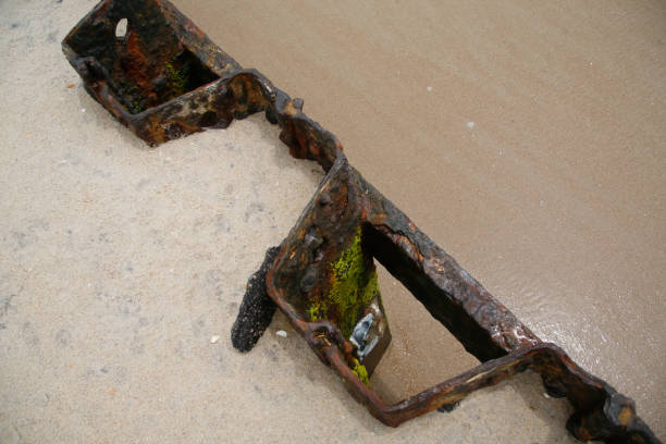 istock Breakwater buried in the sand 1292977614