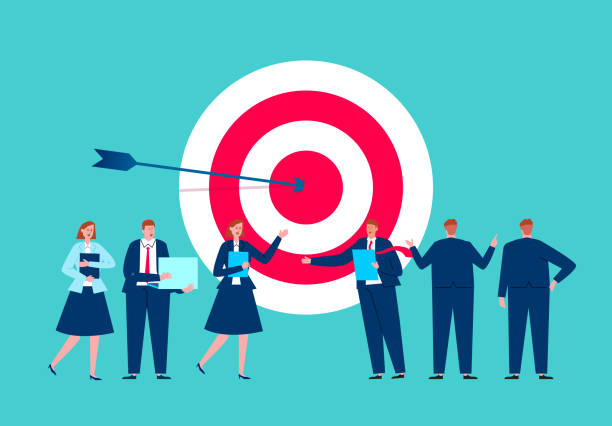 istock Commercial team and target stand together, team goal and project research 1292980906