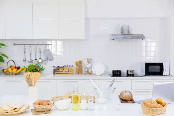istock clean new modern kitchen interior with homemade bread decoration on the table top for background 1292990746