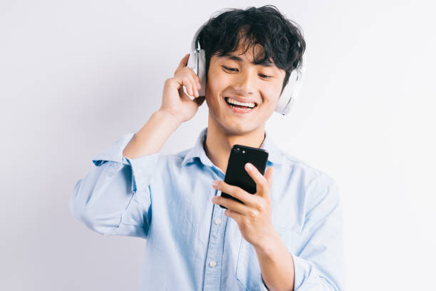 istock listening to music, entertainment 1292991004