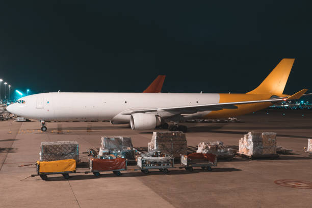 istock Big modern freighter airplane at the cargo ramp 1292996717