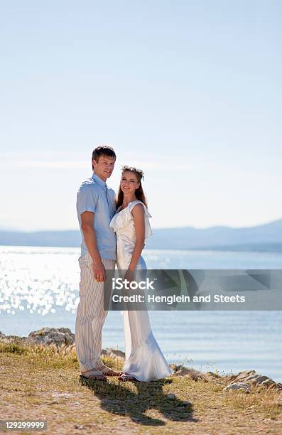 Bride And Groom Standing Outdoors Stock Photo - Download Image Now - 20-24 Years, Adult, Adults Only
