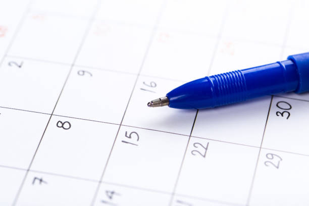 istock white calendar page for 2021 month schedule to make an appointment or manage the schedule every day with ballpoint pen for marks, for work planning and life concept 1293008058