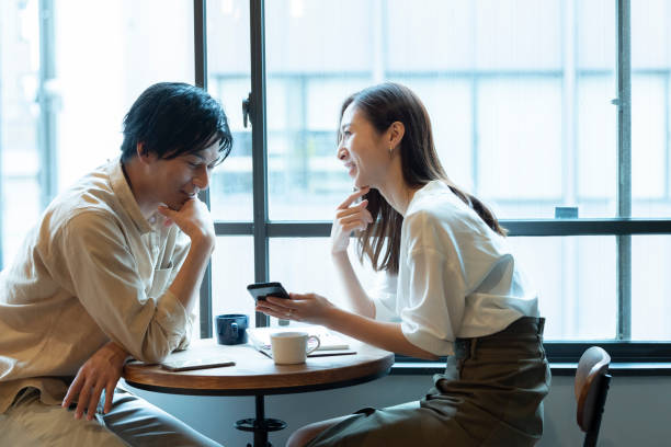 istock A couple having a fun conversation with smile at a cafe 1293009423