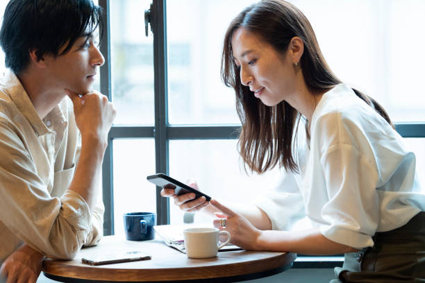istock A couple having a fun conversation with smile at a cafe 1293009436