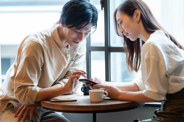 istock A couple having a fun conversation at a cafe 1293009485