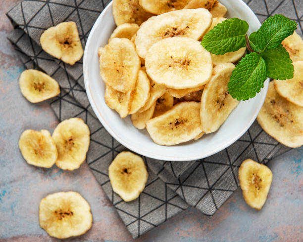 istock Dried candied banana slices or chips 1293011162