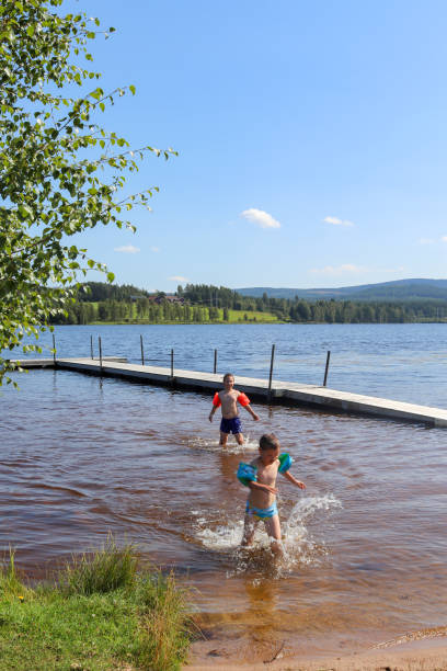 istock Boys bathing in the lake 1293013772