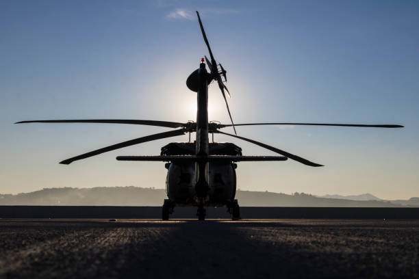 istock UH-60 Military helicopter at sunset 1293014761