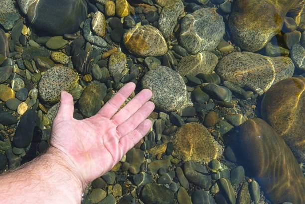 istock Crystal clear water of the mountain river. 1293016498