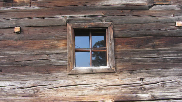 istock wooden window in wooden house 1293017768
